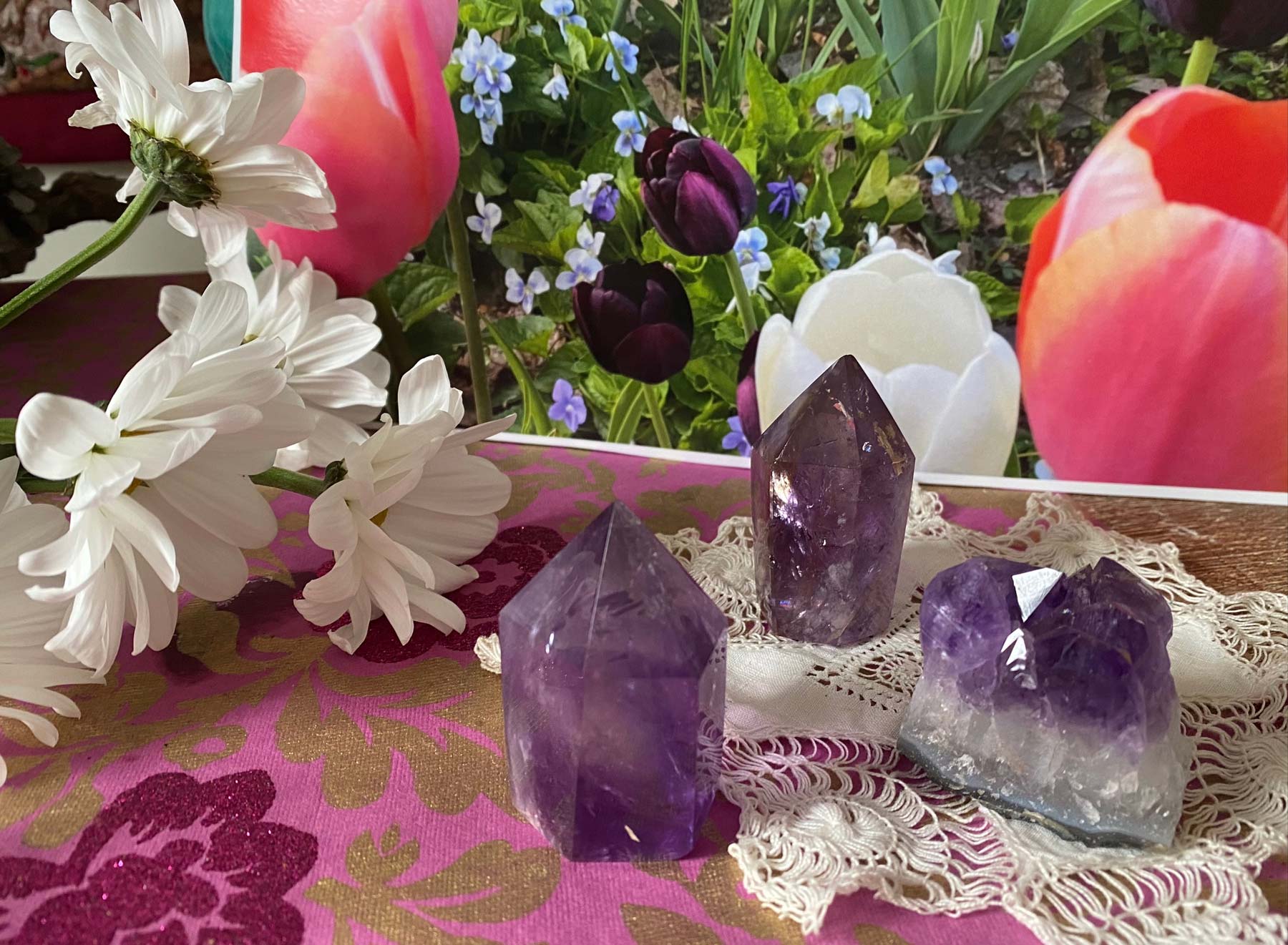 Amethyst crystals, daisies, and tulips